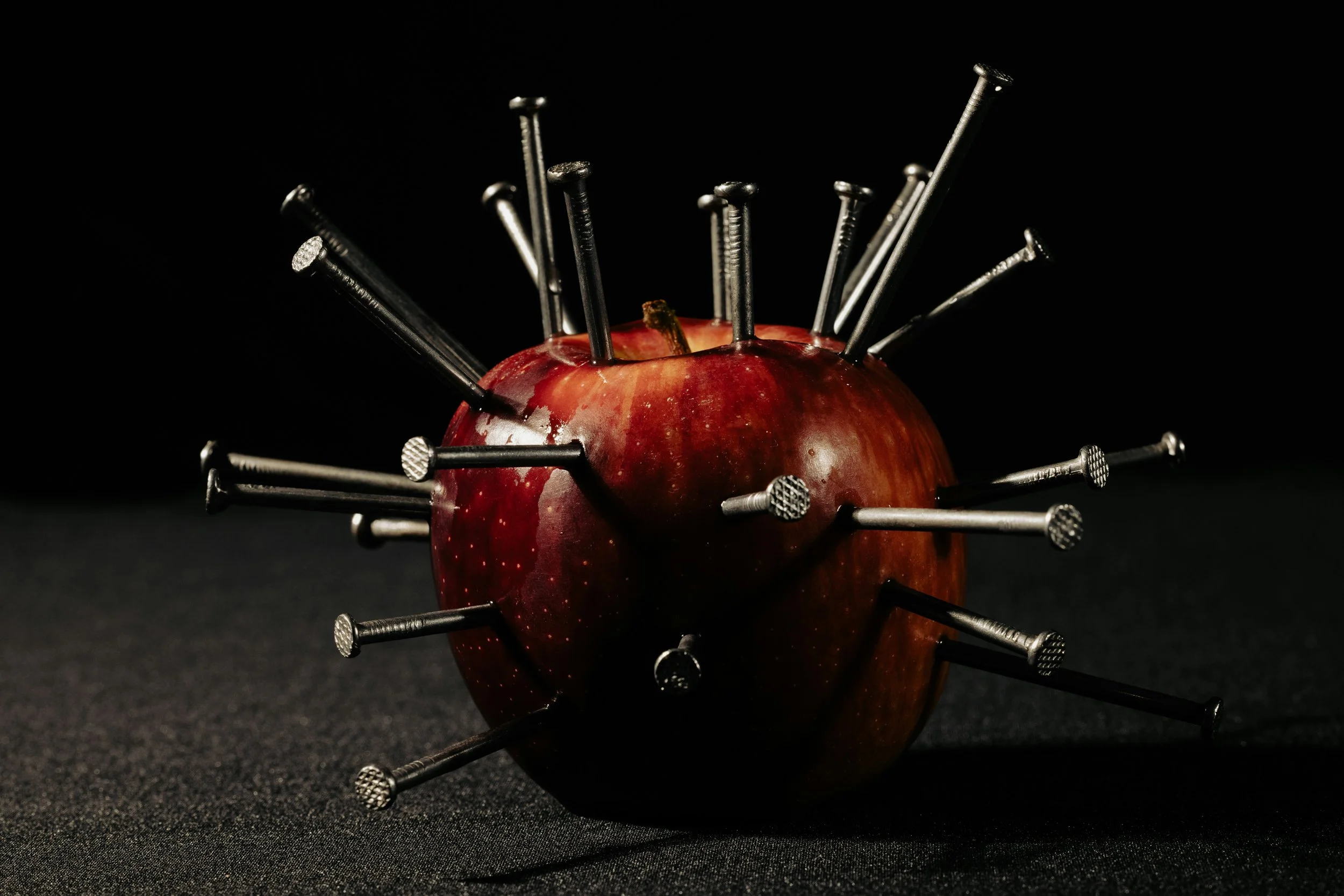 Apple studded with nails