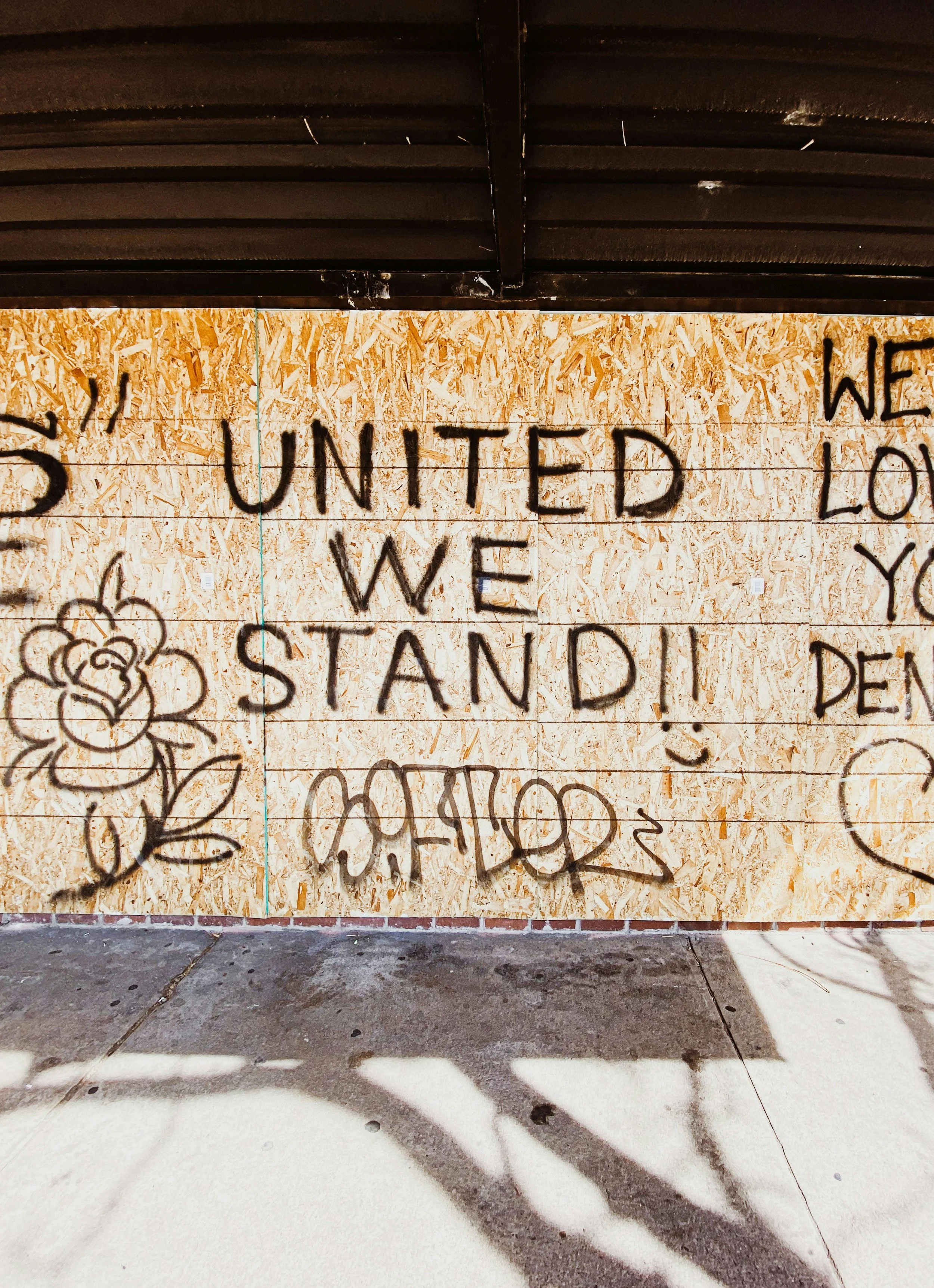 United we stand written on a wall