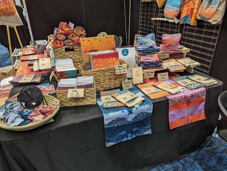 Couple more photos of my set up at @cairnsindigenousartfair!Thanks so much to everyone who popped by and picked something up!

I had four new products this year that were a hit - polo shirts, cushion covers, tablecloths and postcards. I have a few le