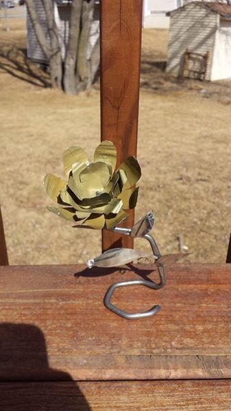 Metal flower made of soup-can lids
