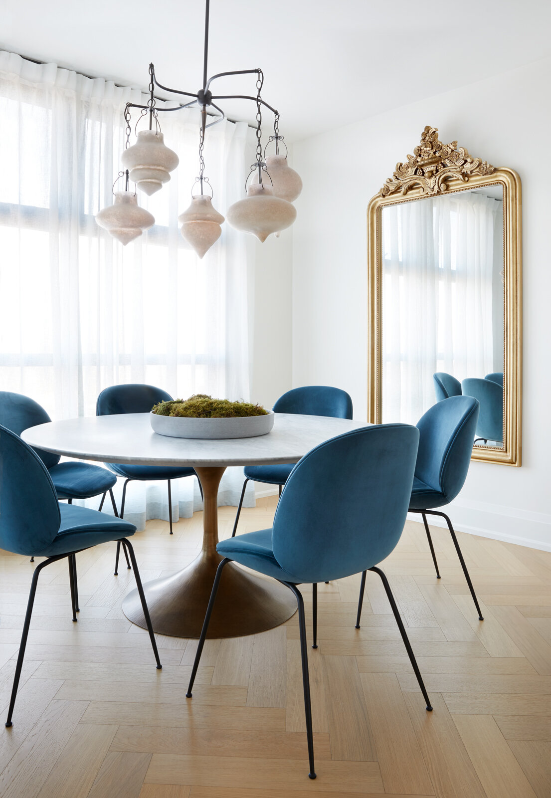 Beech House Condo, Toronto dining room, Toronto condo, Toronto Designer, chevron floors, blond wood floors, white oak floors, contemporary dining room, eclectic dining room, white dining room, tulip table, round pedestal dining table, blue velvet din