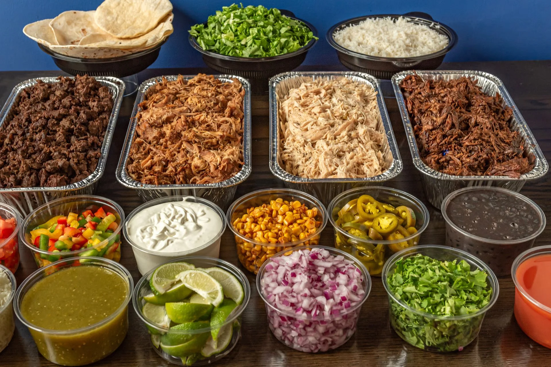 Tacochela corporate catering taco bar setup for office lunch in Downers Grove