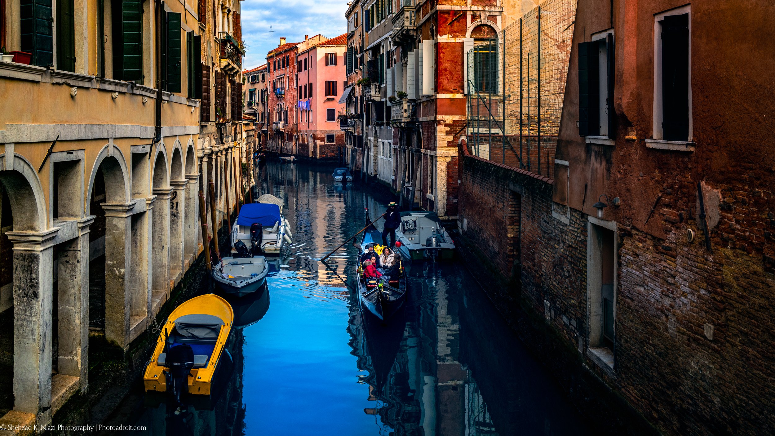 Gondola Riders in Venetian Canal on a cold morning Stitched panorama Leica Q2 in Venice Italy-2.jpg