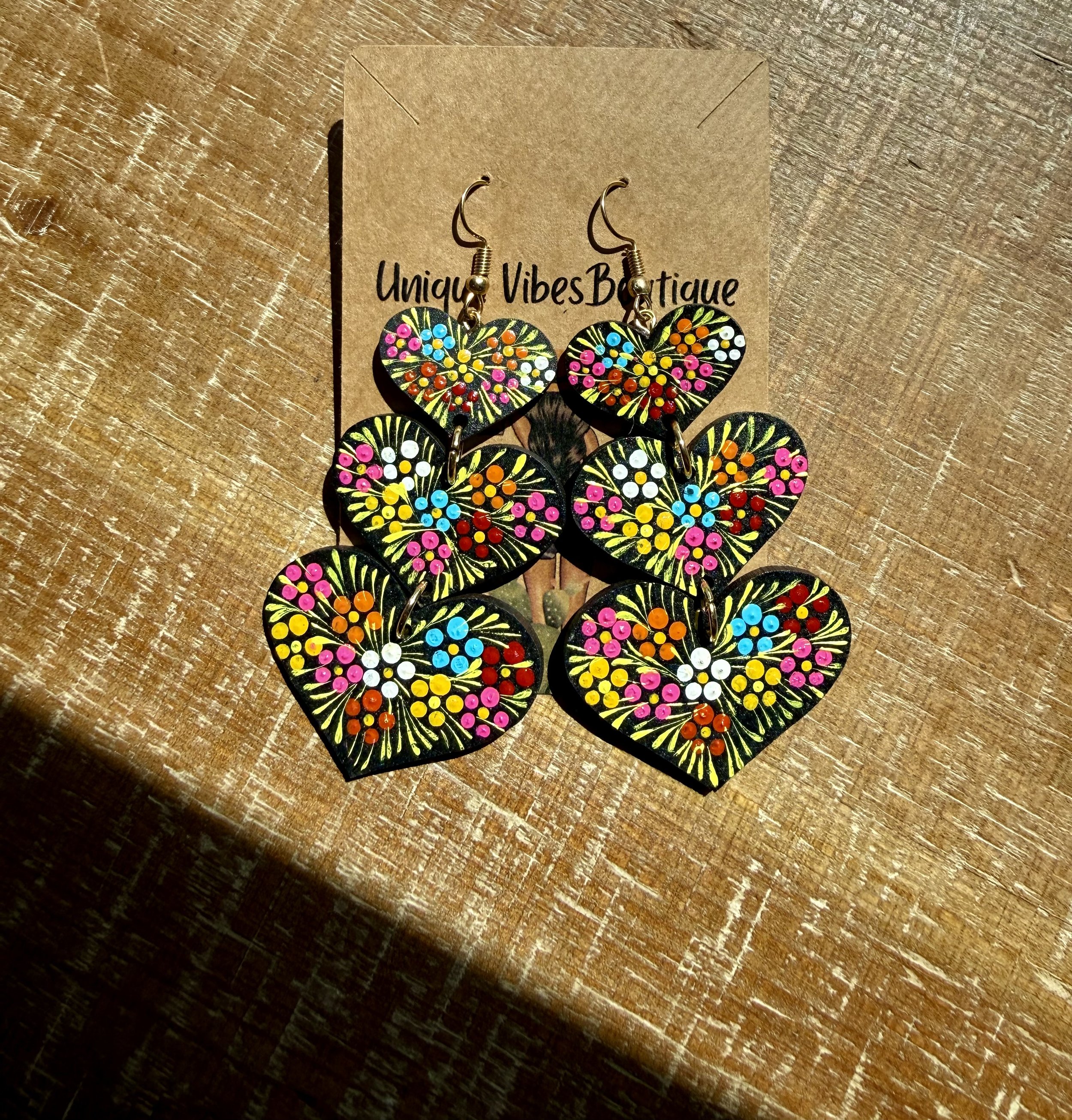 triple heart laca earrings.jpeg