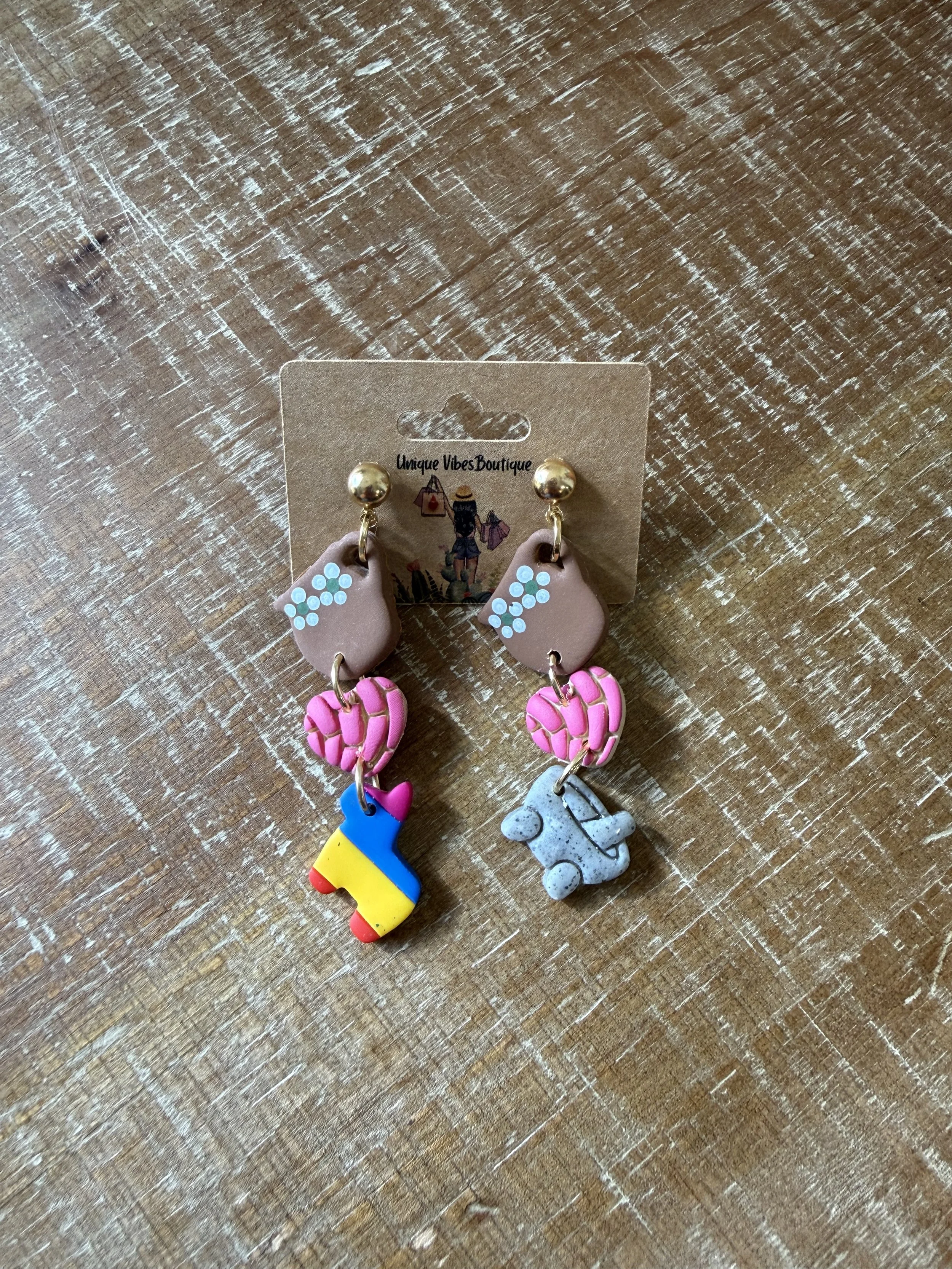 tacita concha burrito earrings.jpeg