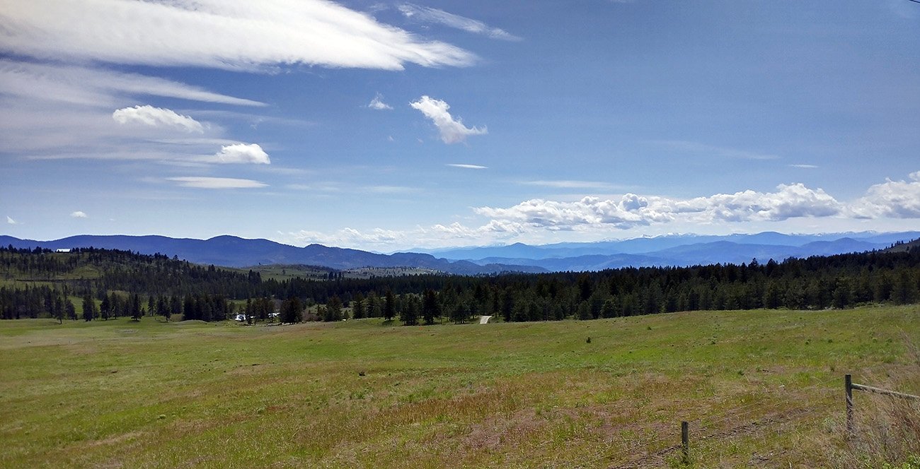 Grassy ranches and farmland characterize the more remote areas at elevation in BC.