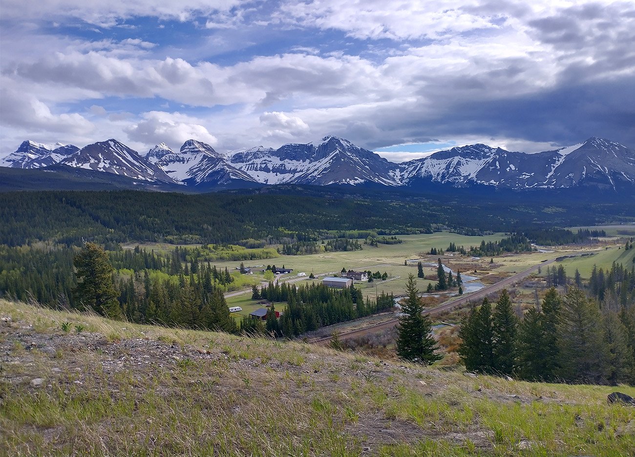 Coming out of CrowsNest pass highway and into Alberta. You can only look back at the Rockies now as you enter Flatland.