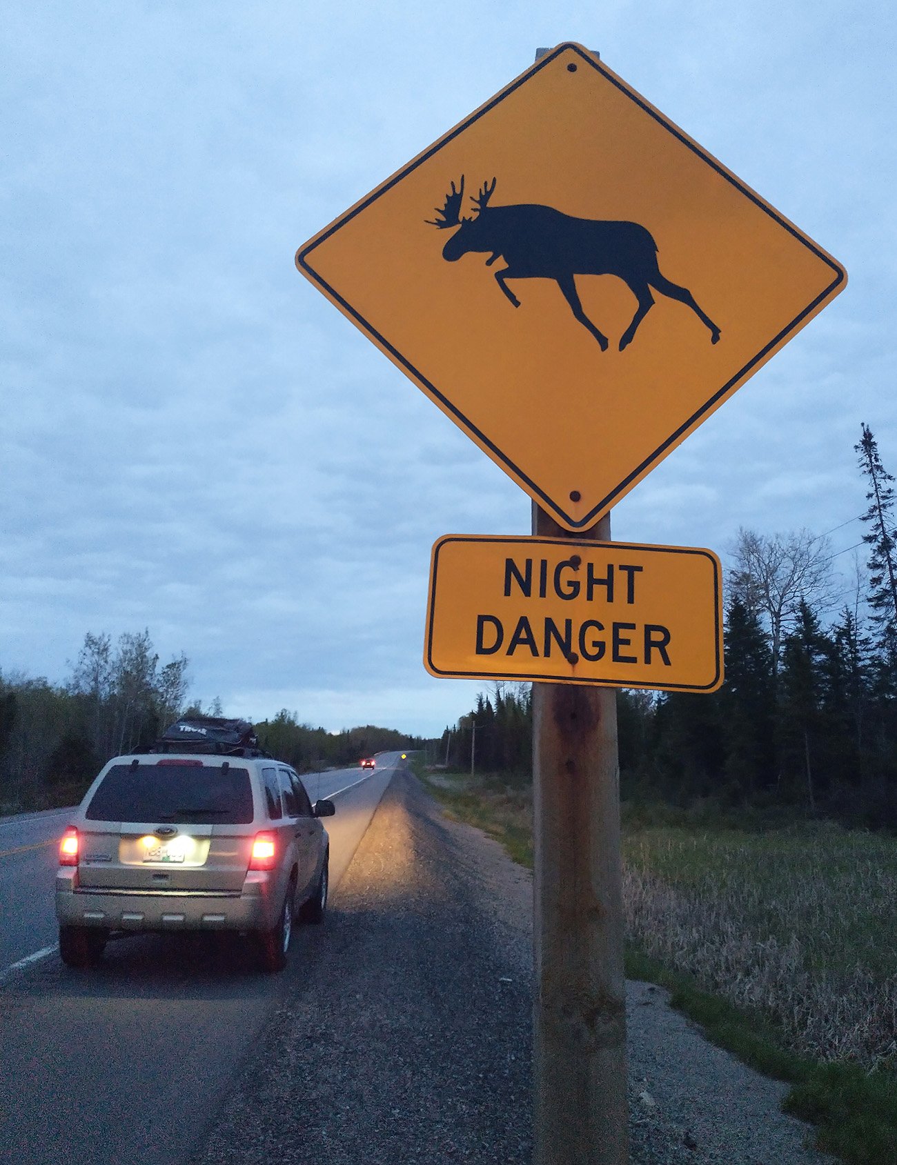 These signs are everywhere in Northern Ontario. They wait for the darkness to go after your car.