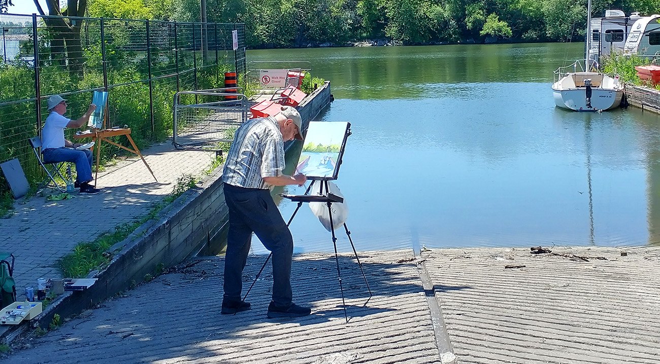 First started along the water and came upon these two gentlemen painting scenery.
