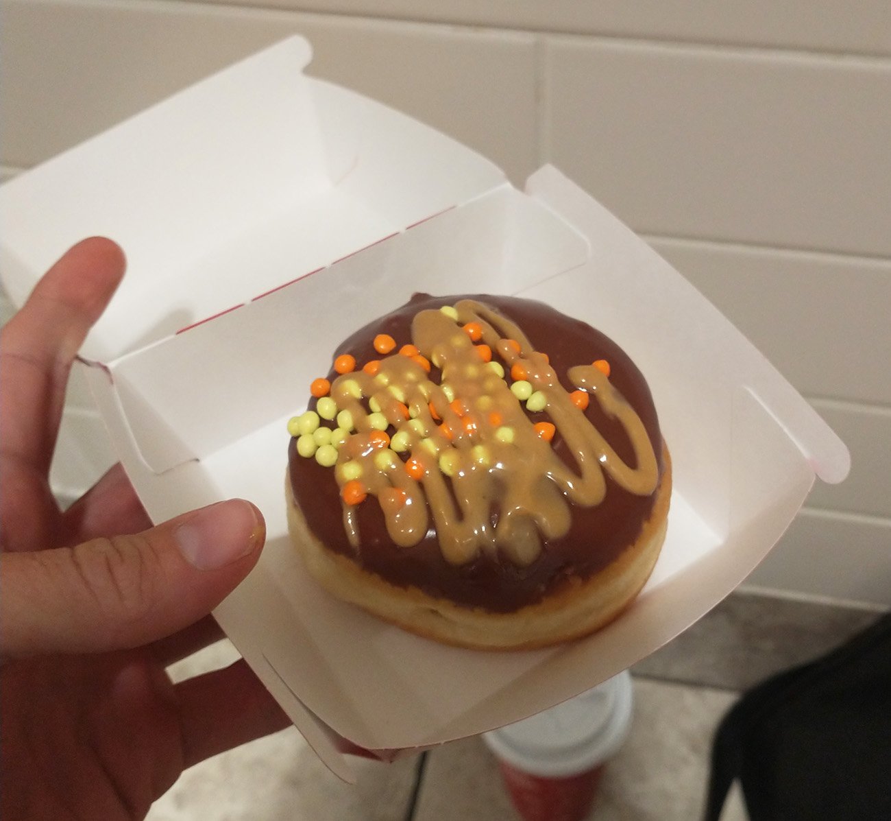My reward donut from Tim Hortons. I'm collecting the points. Every 8th coffee is free! $$$$$$$$ 