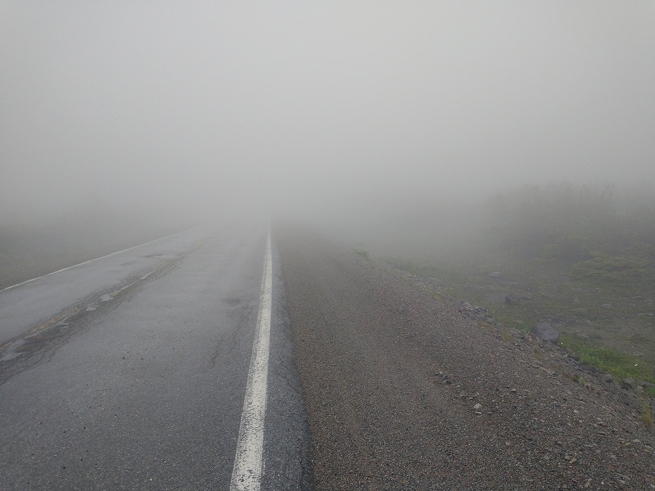 This fog was thick... No one but me was there today. No cars, no bikes. Just me silently rolling in the fog.