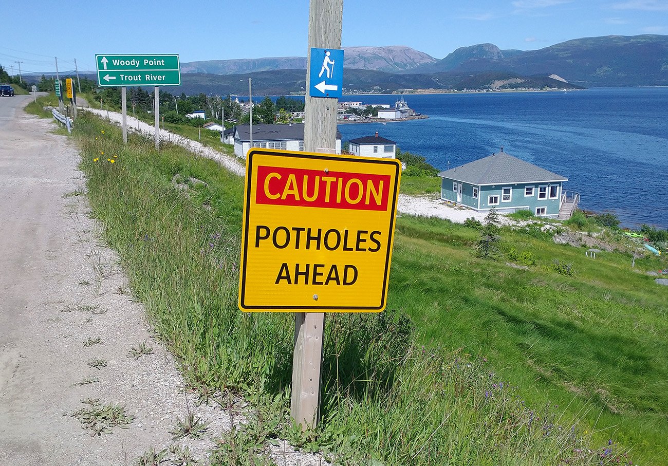 They should export these signs to Quebec, they'd be rich. I'd come to find dozens such signs all over the island, even warning of fixed potholes. So nice!