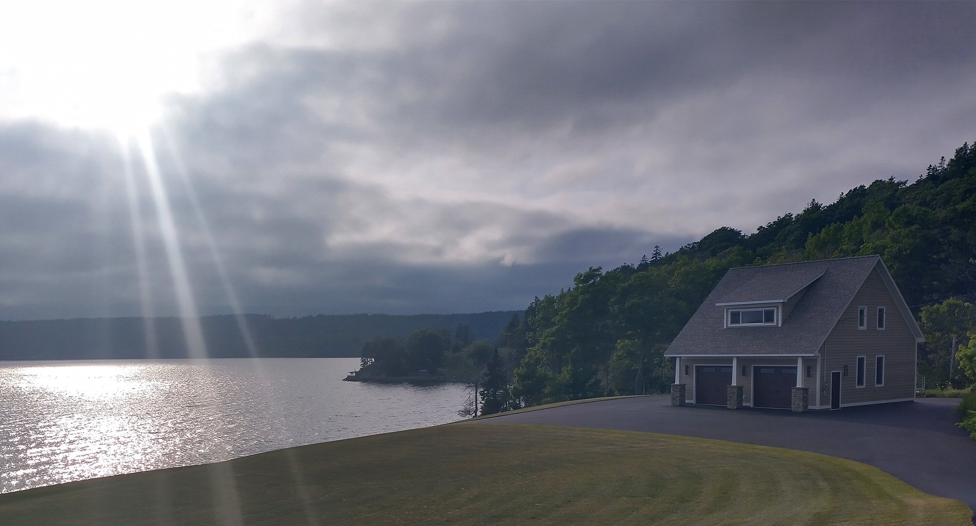 Tons of big homes all around the huge Bras D'Or lake.