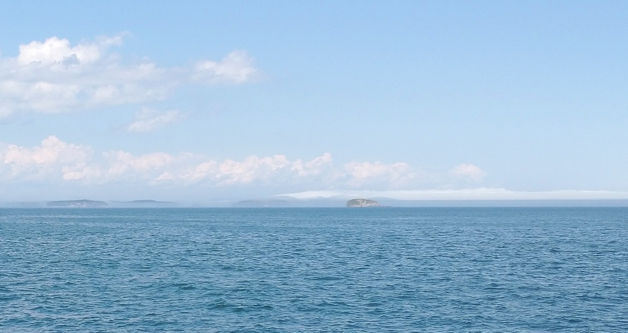There was this cool island in the distance with fog warping around it.