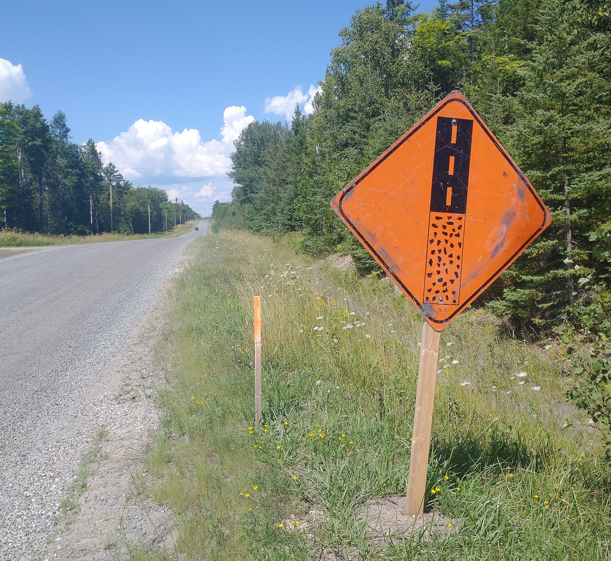 The sign doesn't like. Solid 80km of gravel. Didn't flat somehow. That's amazing.