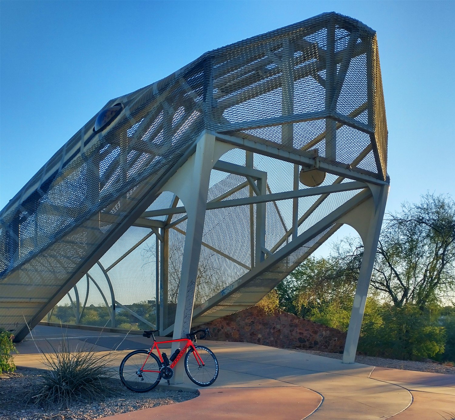 Rattlesnake shaped bike path bridge.