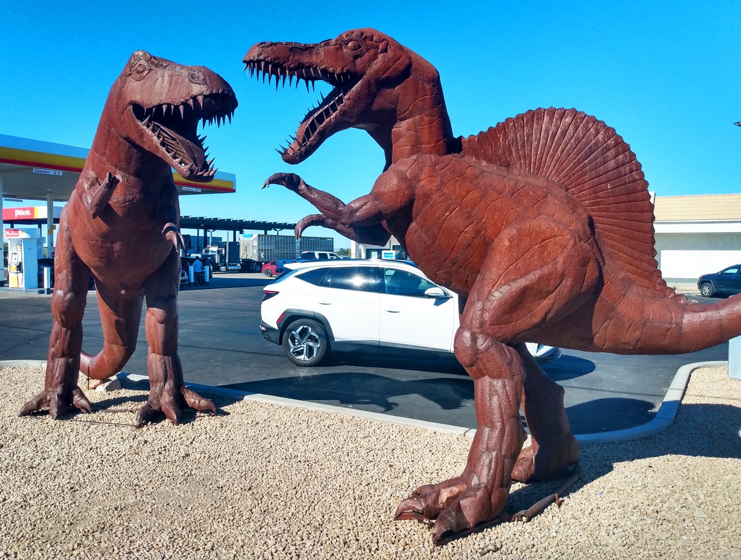 These are very dope. There's a definite trend of roadside dinosaurs in the world.