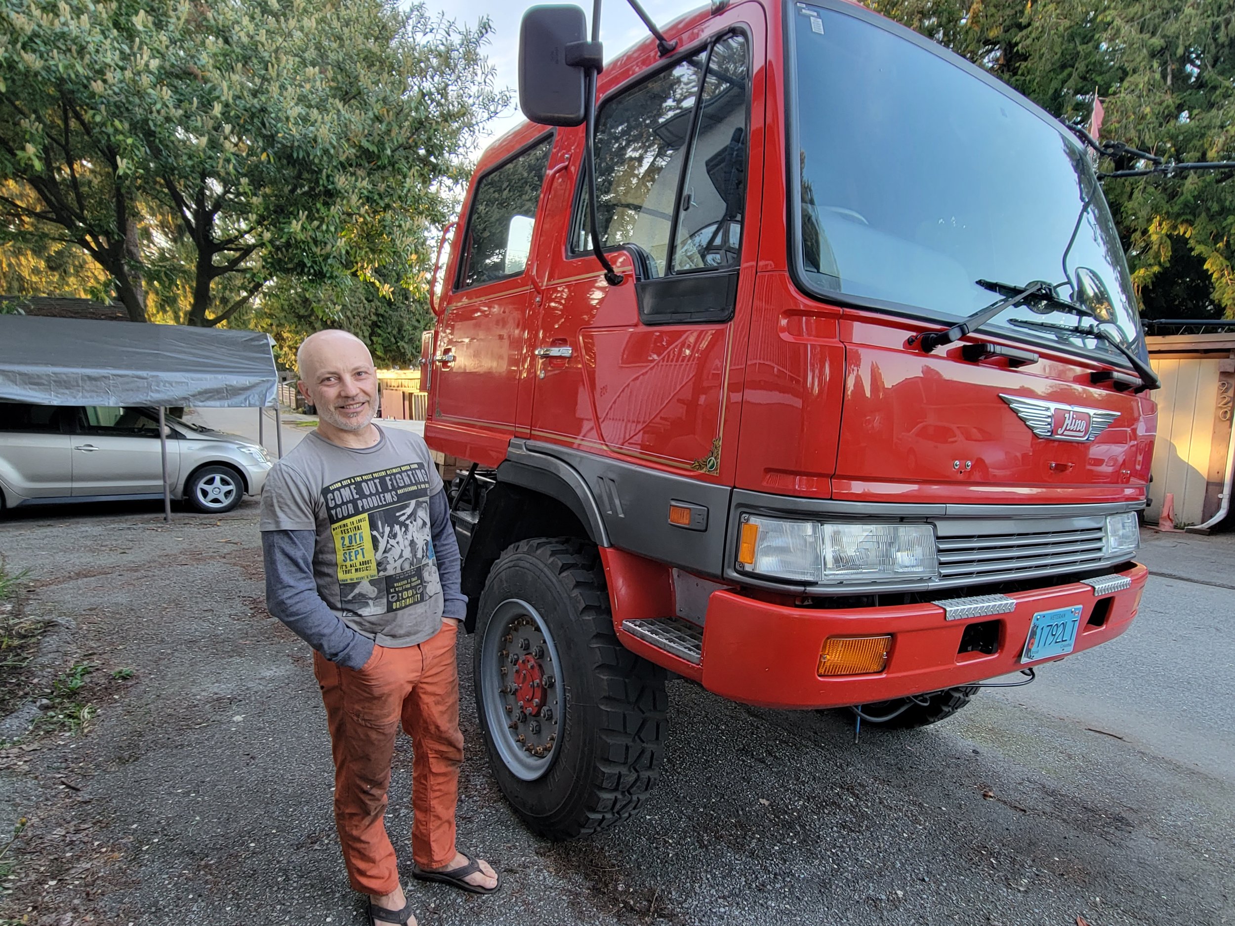 Dave next to a Japanese firetruck he's working on. What a cool project.