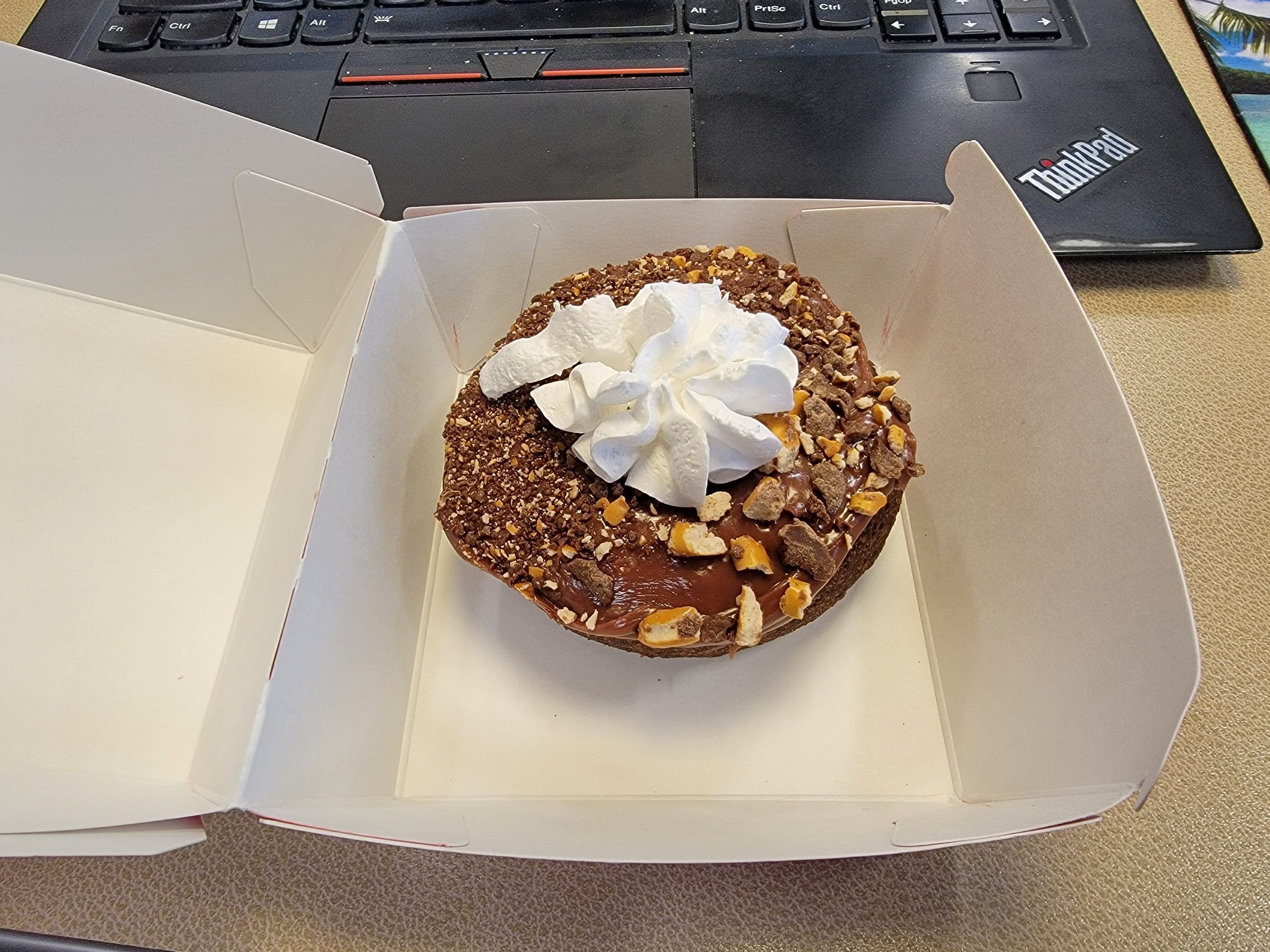 Tim has a new donut for me. Brownie pretzel thing on chocolate cake donut. 7/10