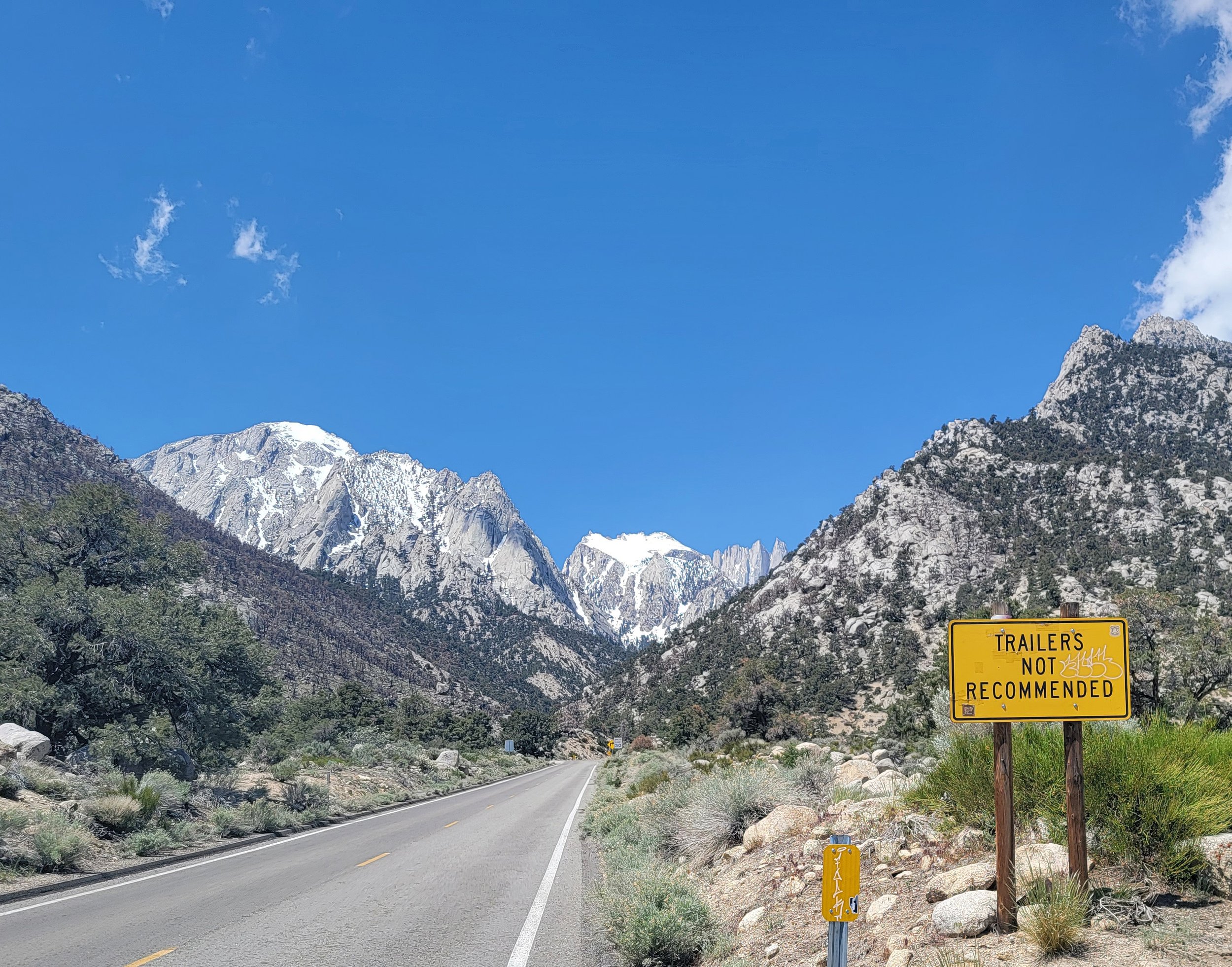 I love signs that just dispense good life advice. Mount Whitney in the middle there.