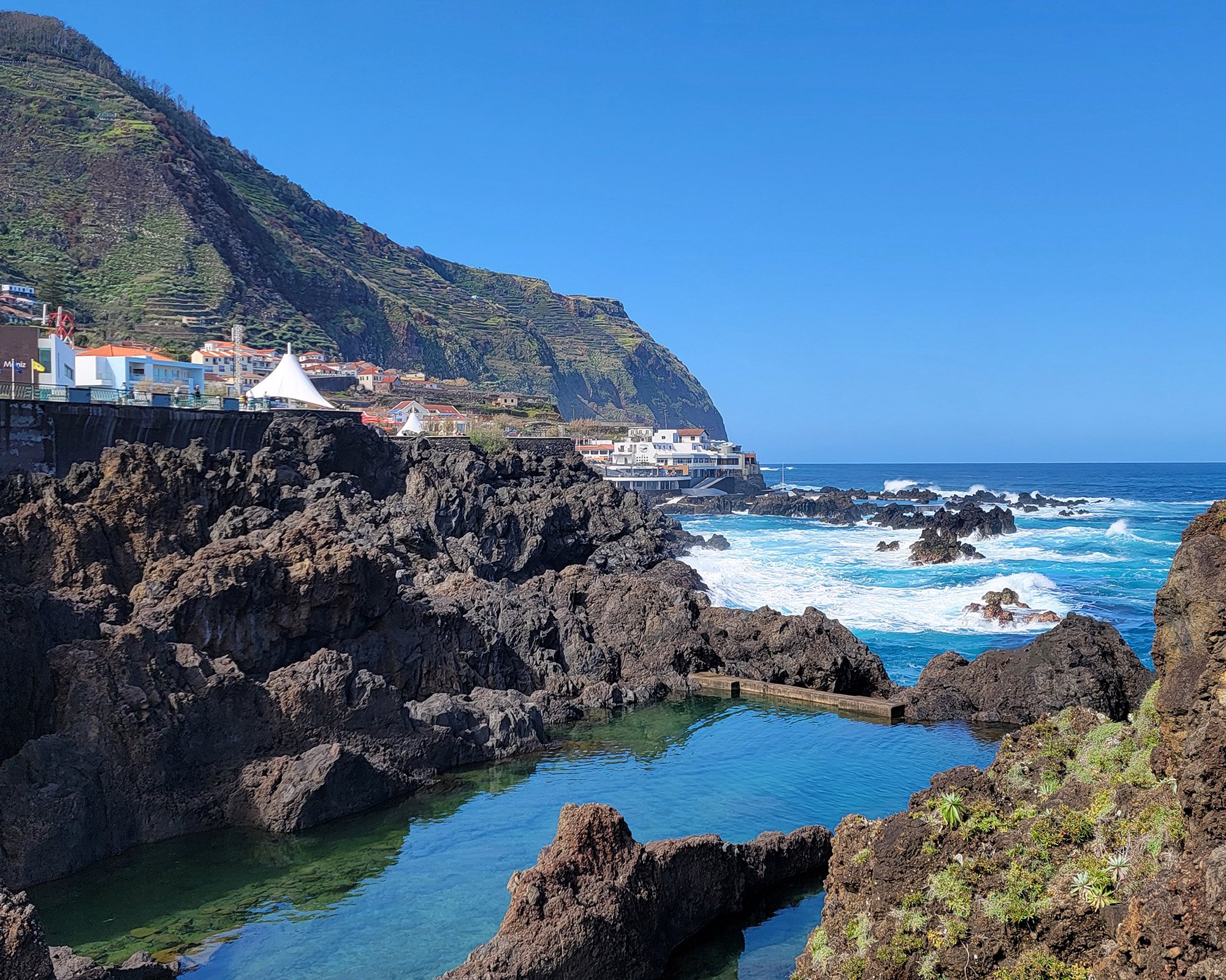 Porto Moniz is definitely worth a visit, though it'll cost you 70+ euro to take a cab there. Alternatively there is a slooooooooow bus ( 3 hours ) that drops tourists off all over the Island.