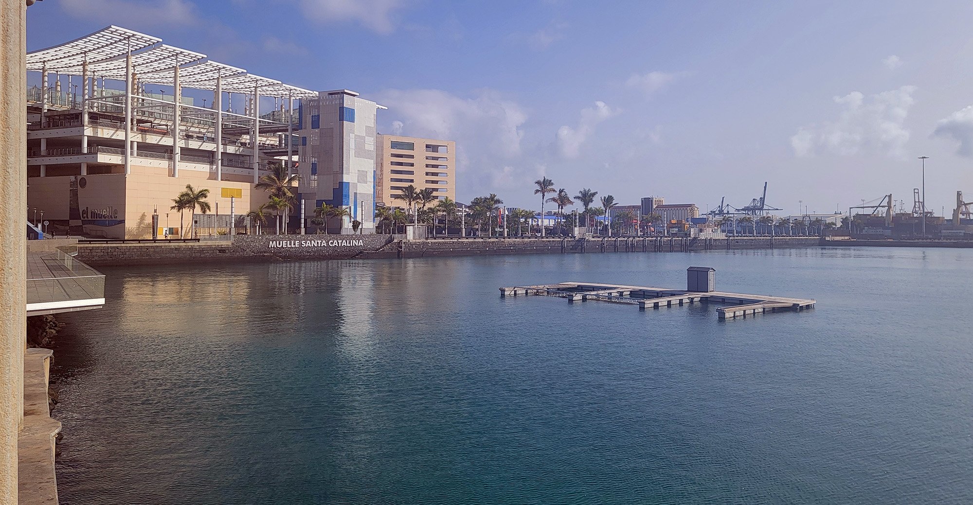 There's a huge mall near the aquarium as well as some more modern buildings. However for the love of fuck don't plan on driving in that chaos.