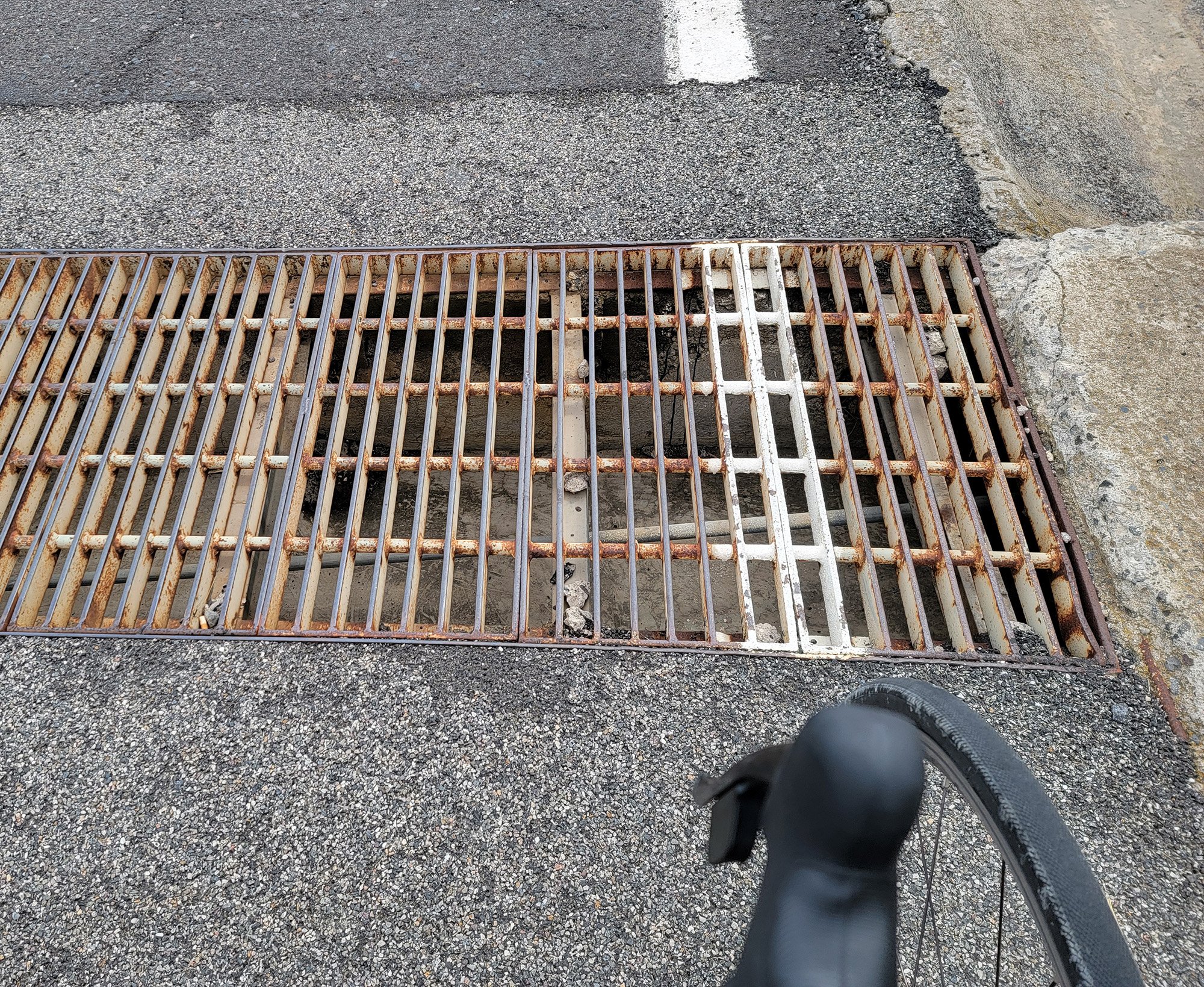 When you ride around some of the towns you'll notice the brain surgeons who designed the roads put these drainage grates in random places.