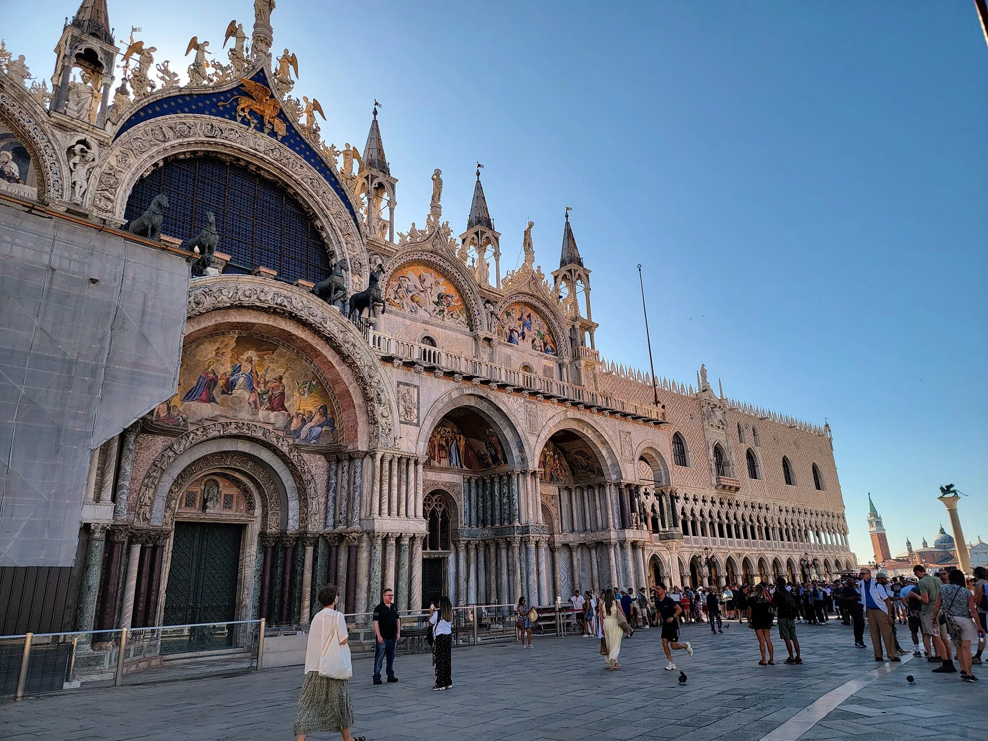 St Mark's Basilica in St Mark's square. It's a gigantic wide open plaza, feels like one of the only places people could gather in the city.