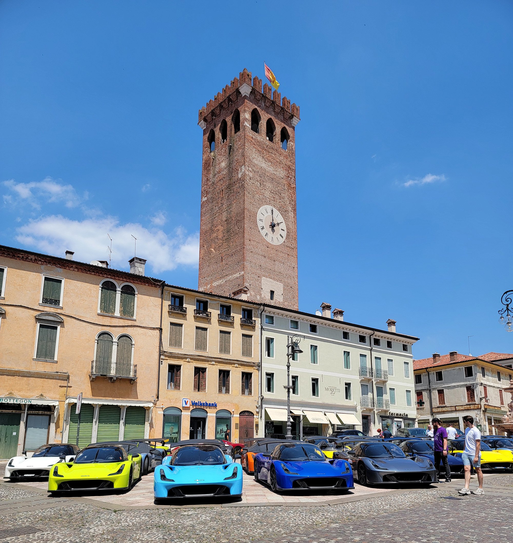The main plaza with its iconic clock tower. They were having some kind of luxury car show that day.