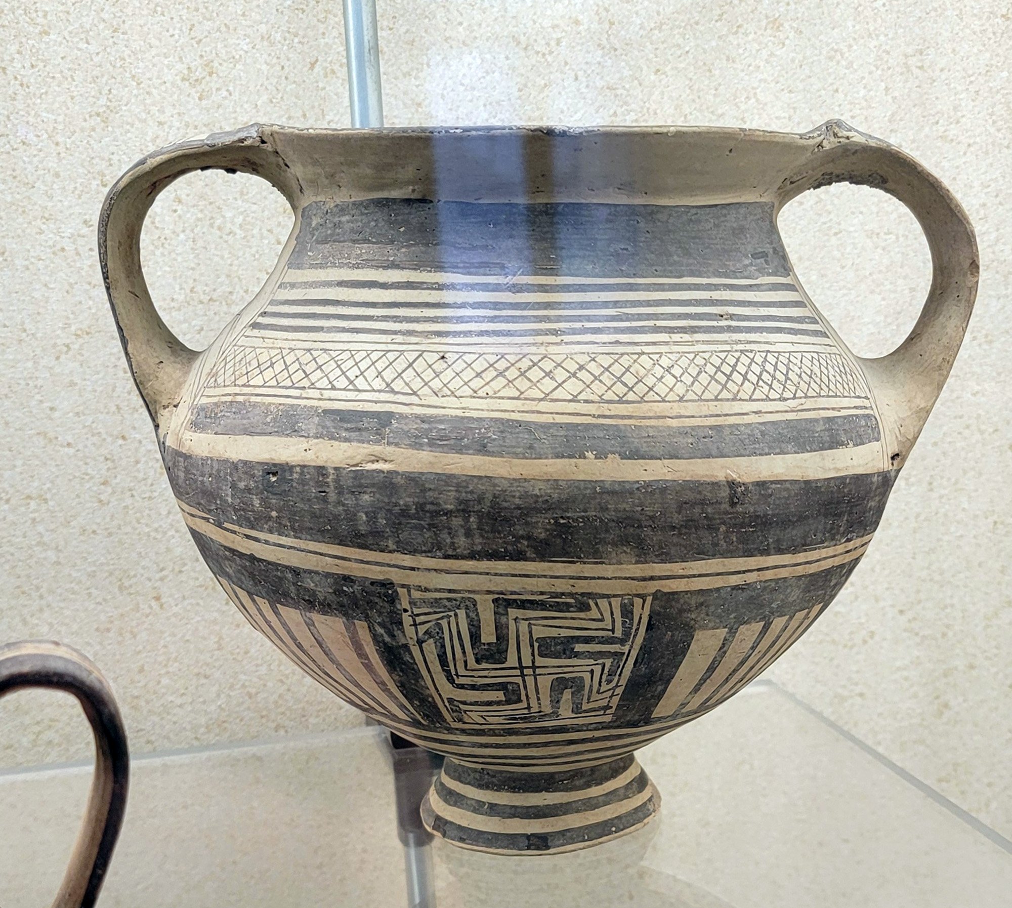 Non-PC ancient pot.