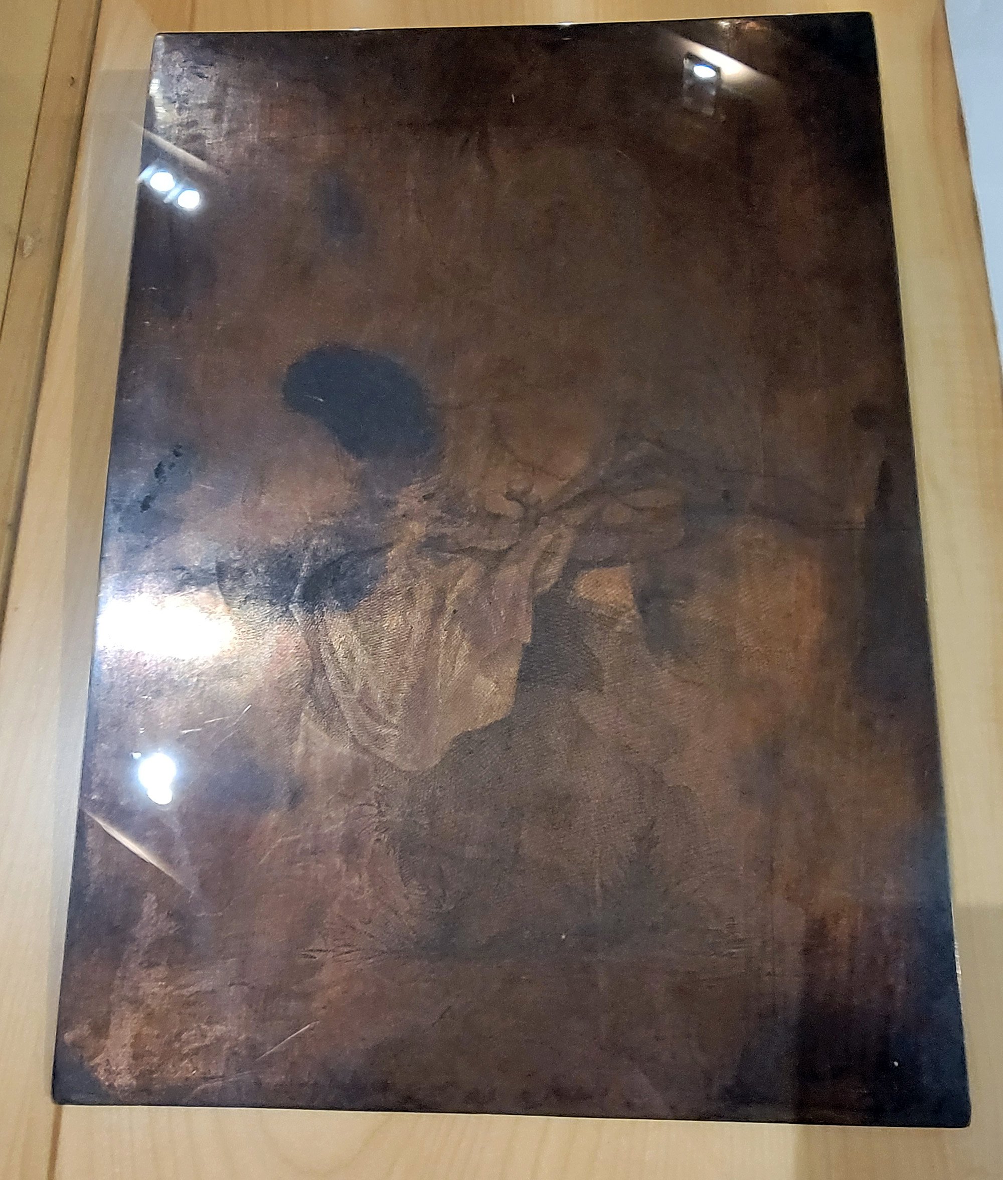 A plate used for engraving. Slater it in black ink and press it onto paper and you get...