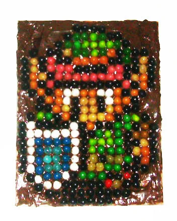 Pixel Link drawn with Jelly Beans on a base of Nutella. Genius I know.