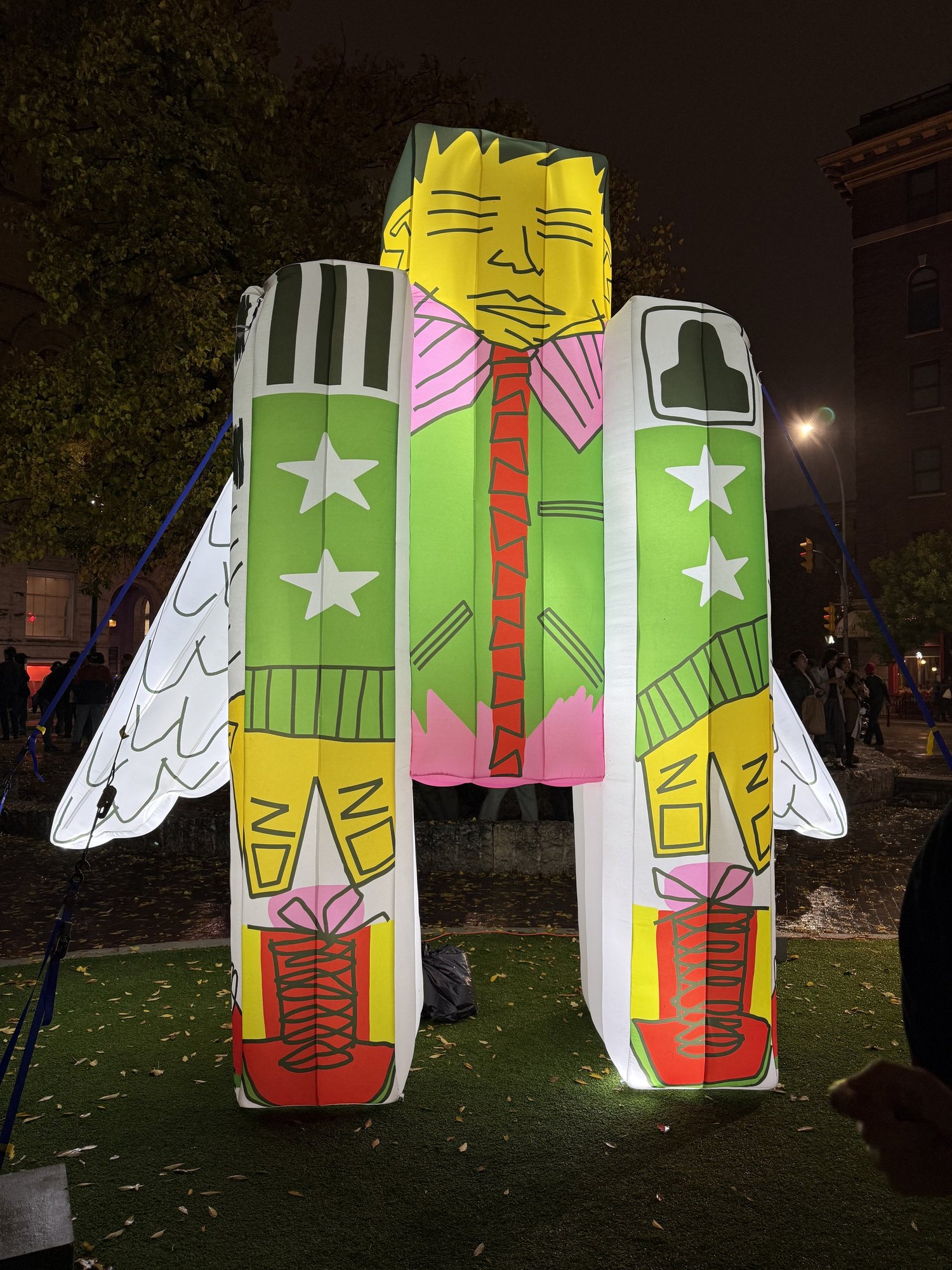 Green character · illuminated at night