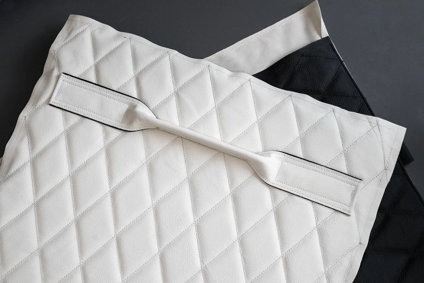 Due to the considerable overall weight of these covers as a result of incorporating inch thick foam and plastic panels, handles are essential for removal and installation. As with everything else, these are a bespoke design to this project, comprisin