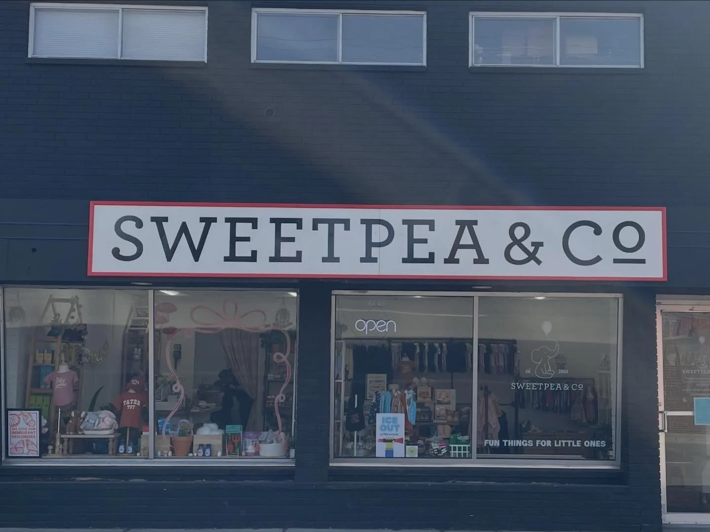 Custom built and hand lettered store front signage