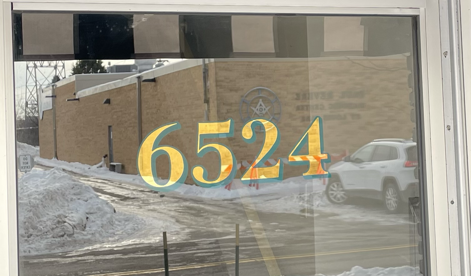 Reverse glass gold leaf address numbers for Sota Clothing