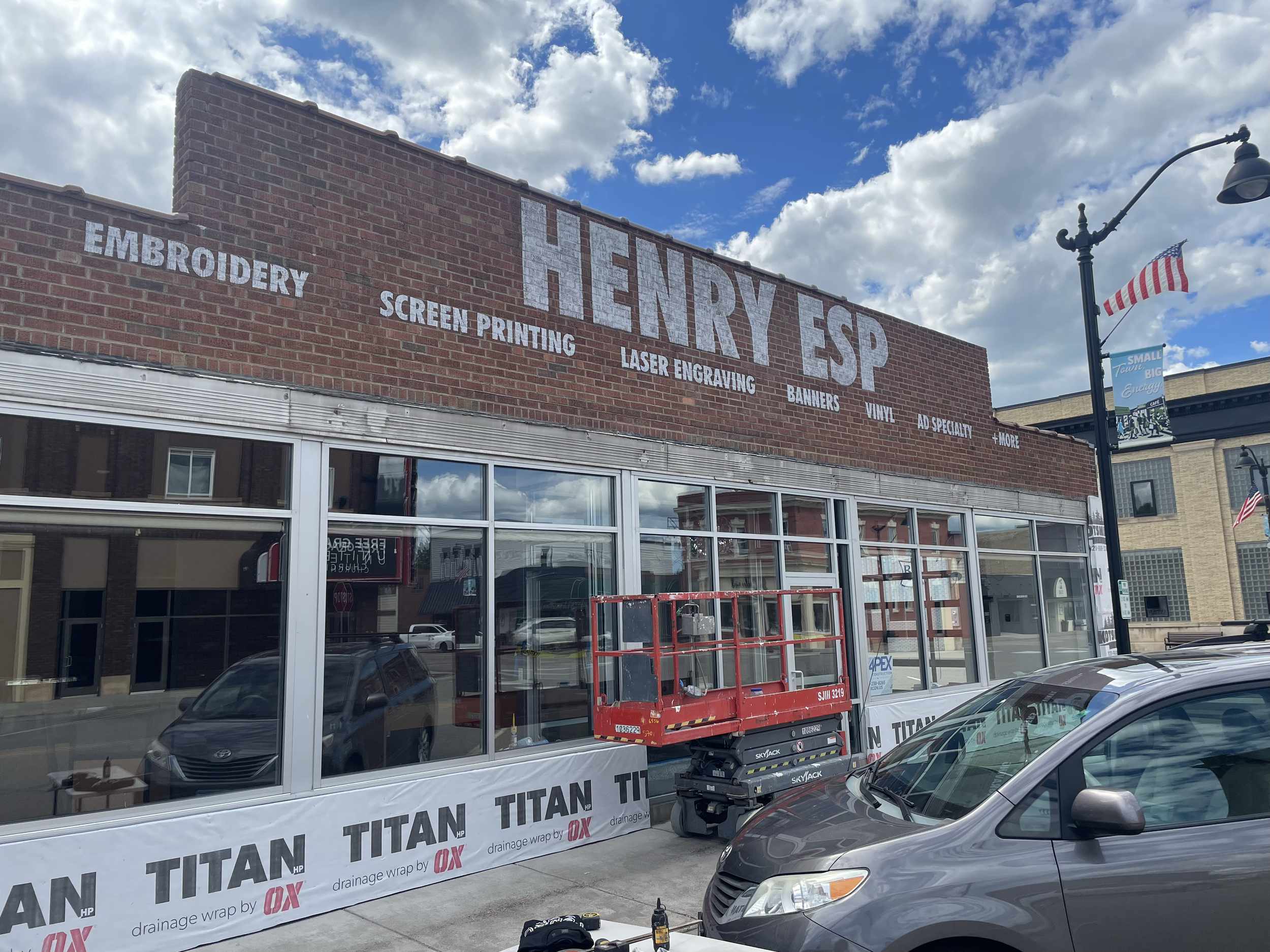 hand painted and distressed store front signage