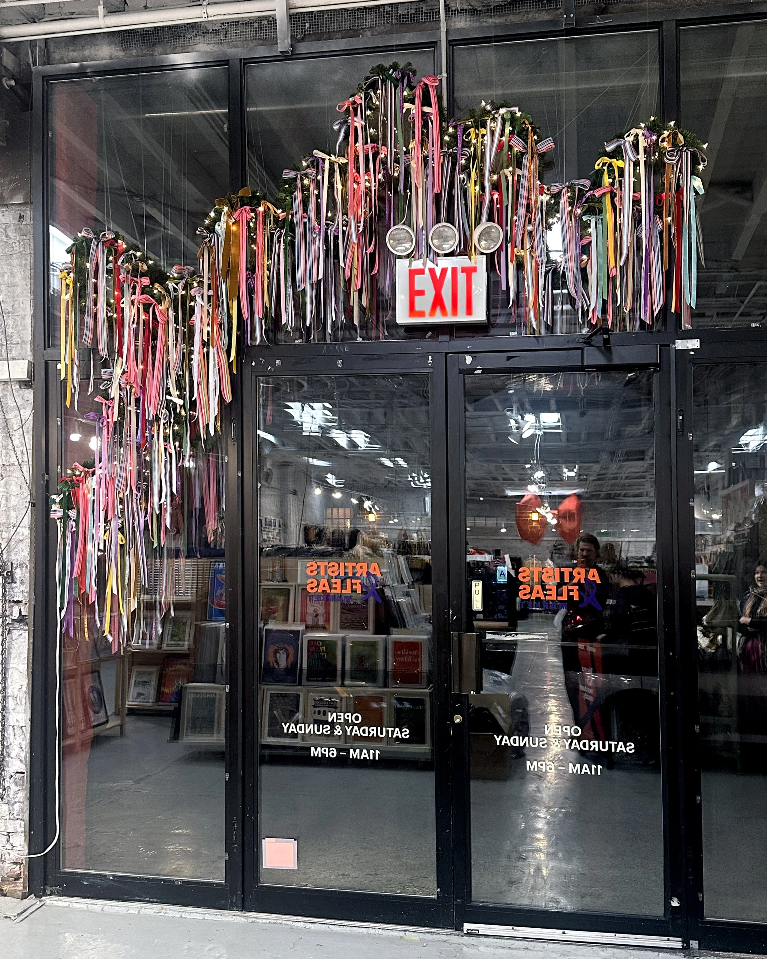 Wreath Installation in Artist and Fleas - Retail Window Design 