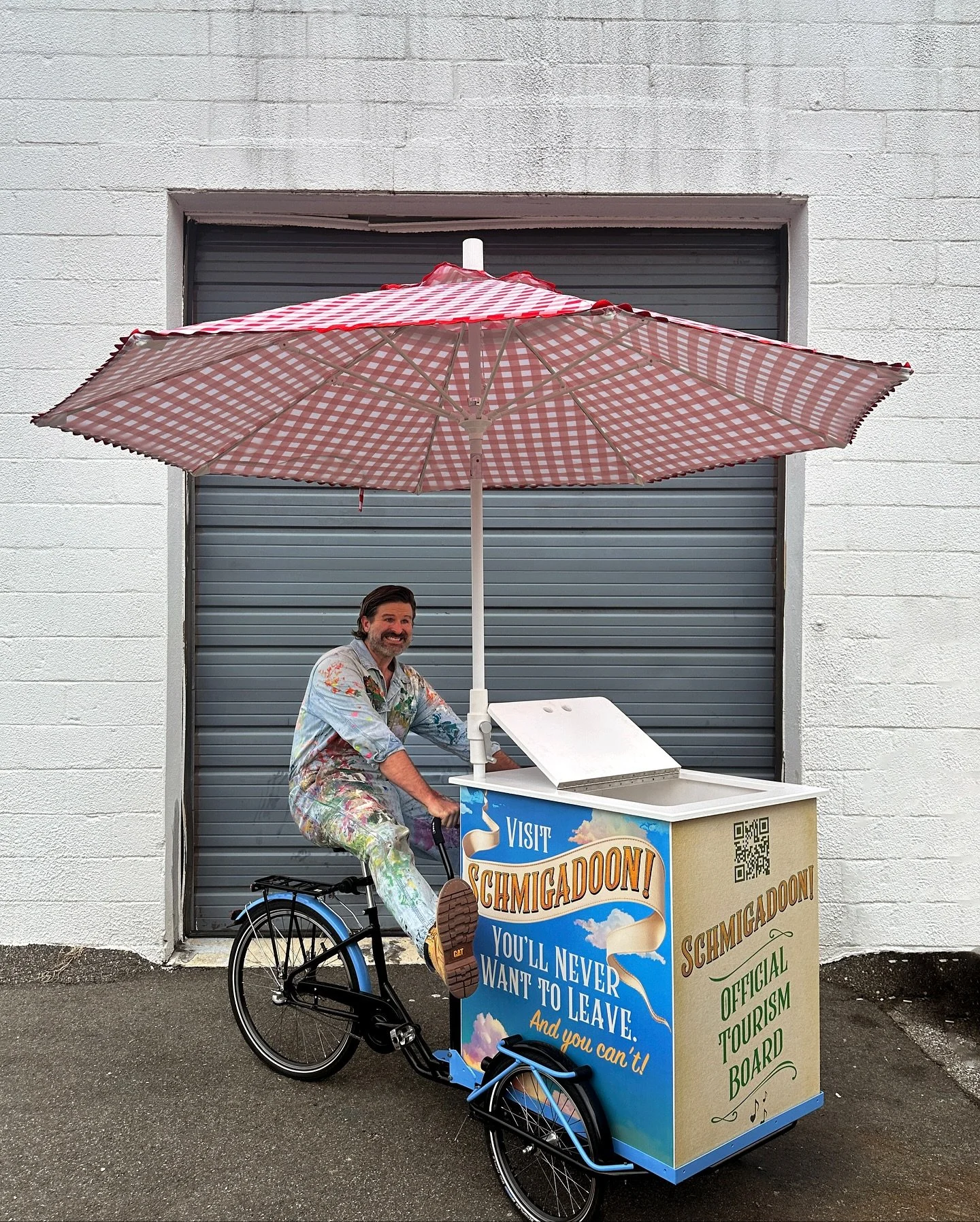 The Offical Tourism Board of @schmigadoon!  Thanks @aka_nyc trusting us with making this mobile tourism stand.  A custom cargo box, umbrella and paint job made this bike ready to sell a one way ticket to #Schmigadoon!  Keep your eyes peeled as you mi