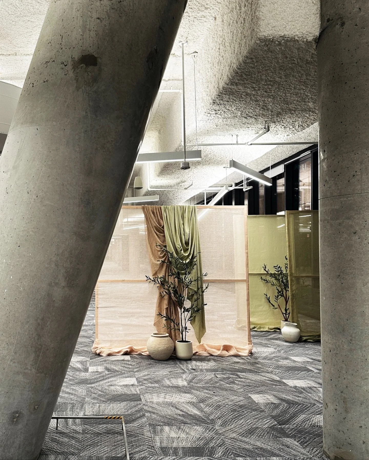 As the @bloomingdales event unfolded, the design story continued beyond the tables. Oversized frames &mdash; some standing at eight feet tall &mdash; and softly draped panels shaped the path for guests, creating an elegant flow through the vast venue