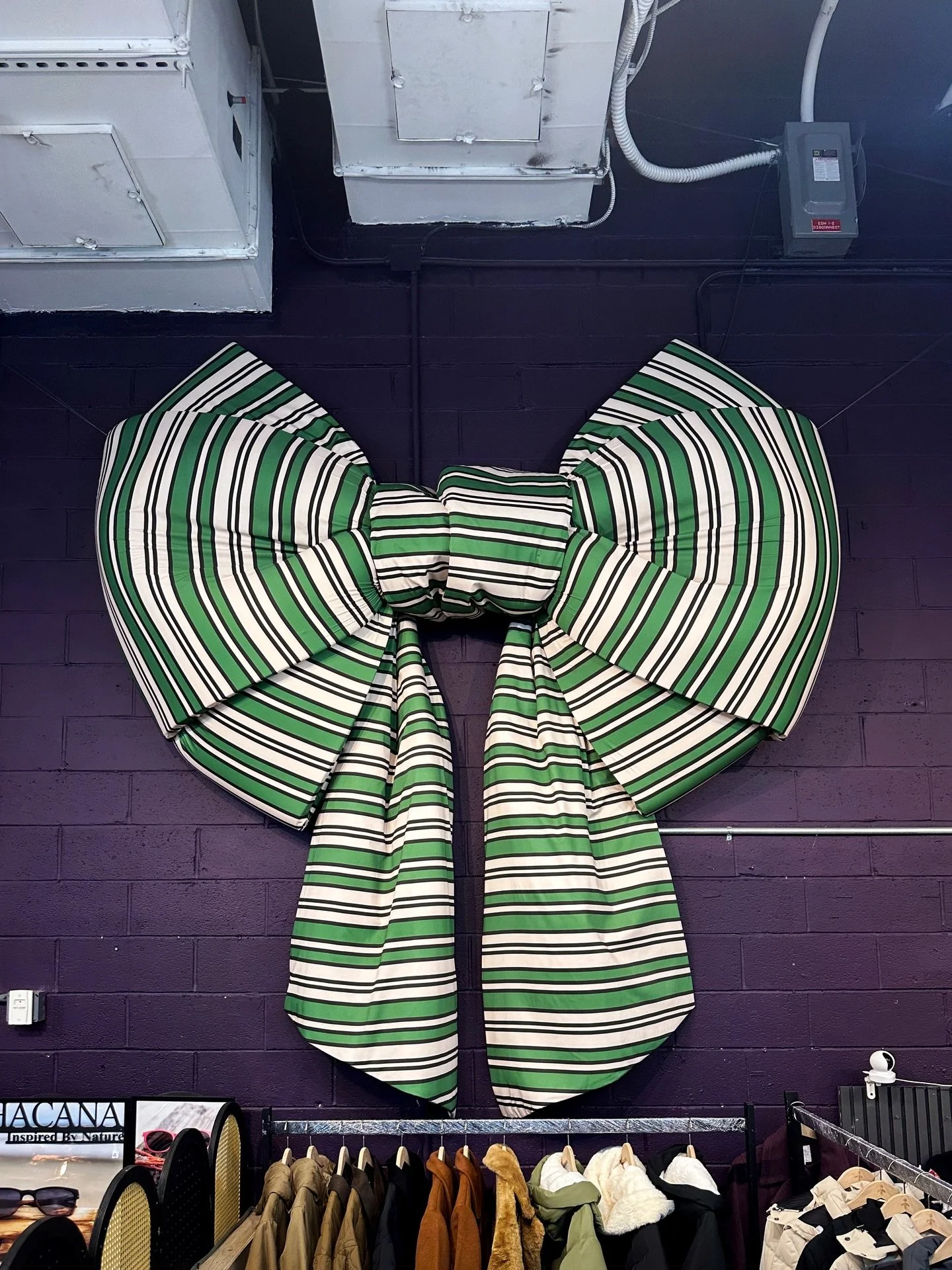 Unveiling four eight-foot bows crafted for Artist &amp; Fleas, each sculpted from foam and fabric and designed with its own distinct personality. Two now hang in Chelsea, two in Williamsburg, bringing oversized charm to both spaces. Visit these locat