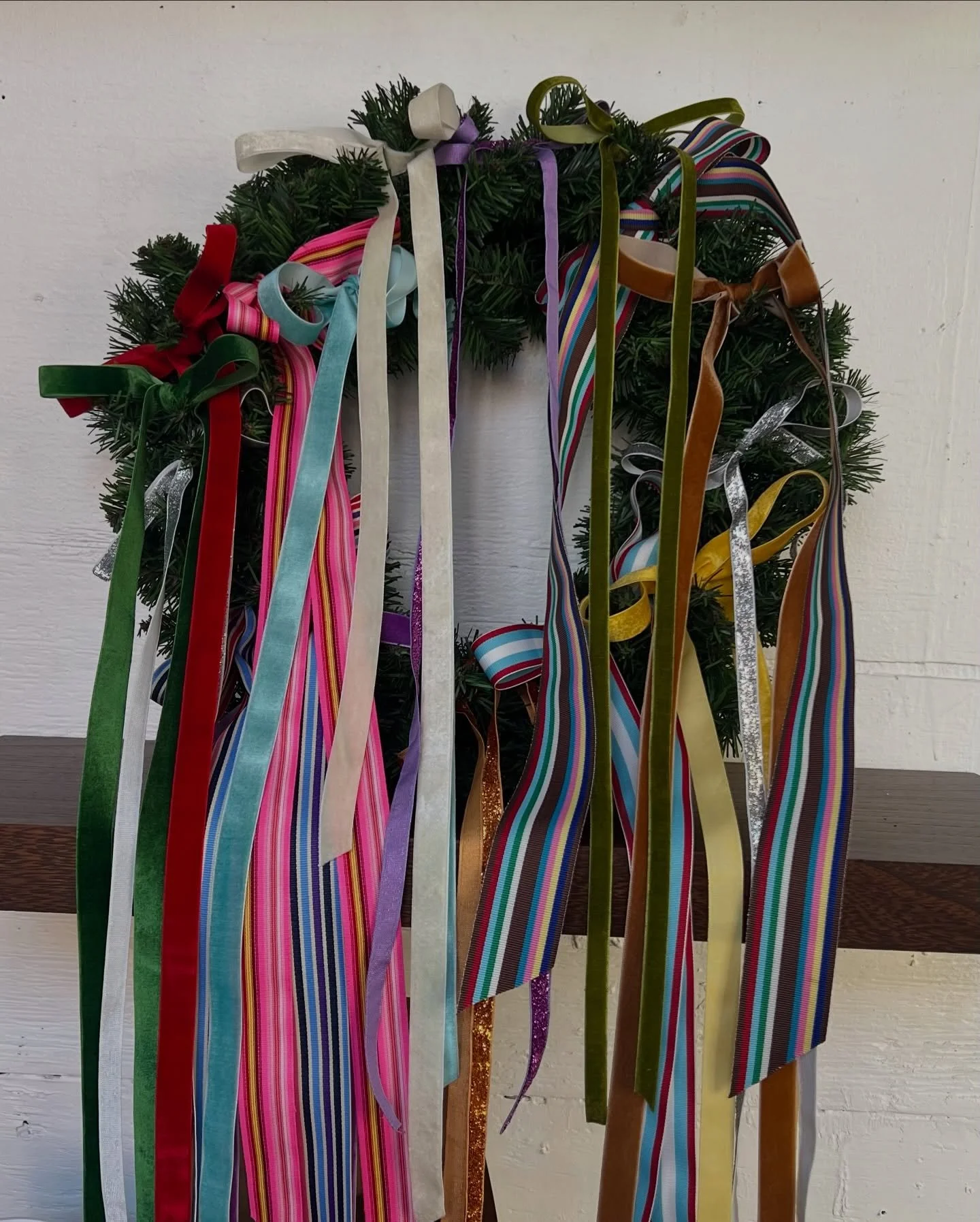 These installations takes the traditional Christmas wreath and rethink it into something more abstract and expressive. Individual wreaths are grouped together in a loose, organic arrangement, creating a sense of movement rather than perfect symmetry.