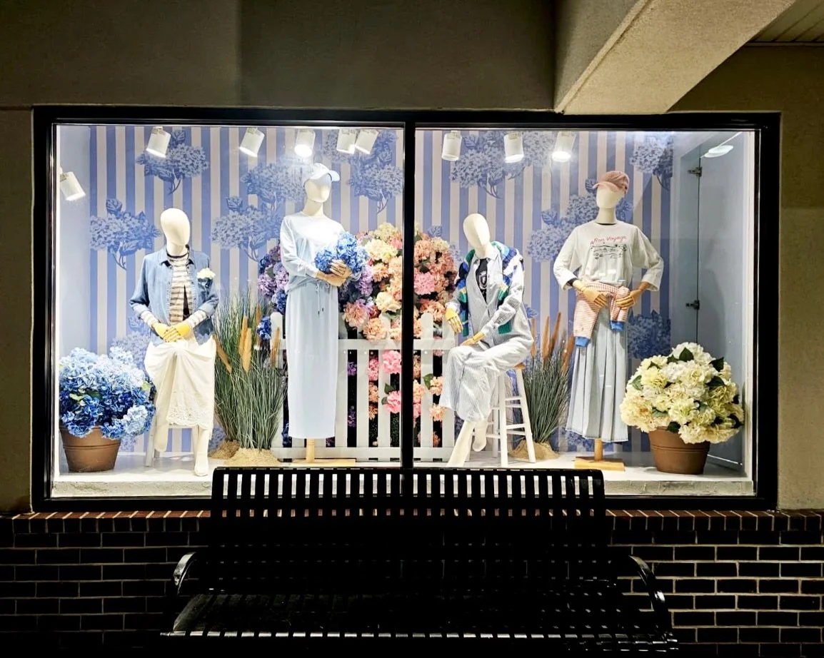 Hydrangea Haze, translated across storefronts!  This landscape window is a more compact version on the full expression, but the big ideas still translate. We kept the focus on maximum floral impact, a grouping of mannequins to highlight the key looks