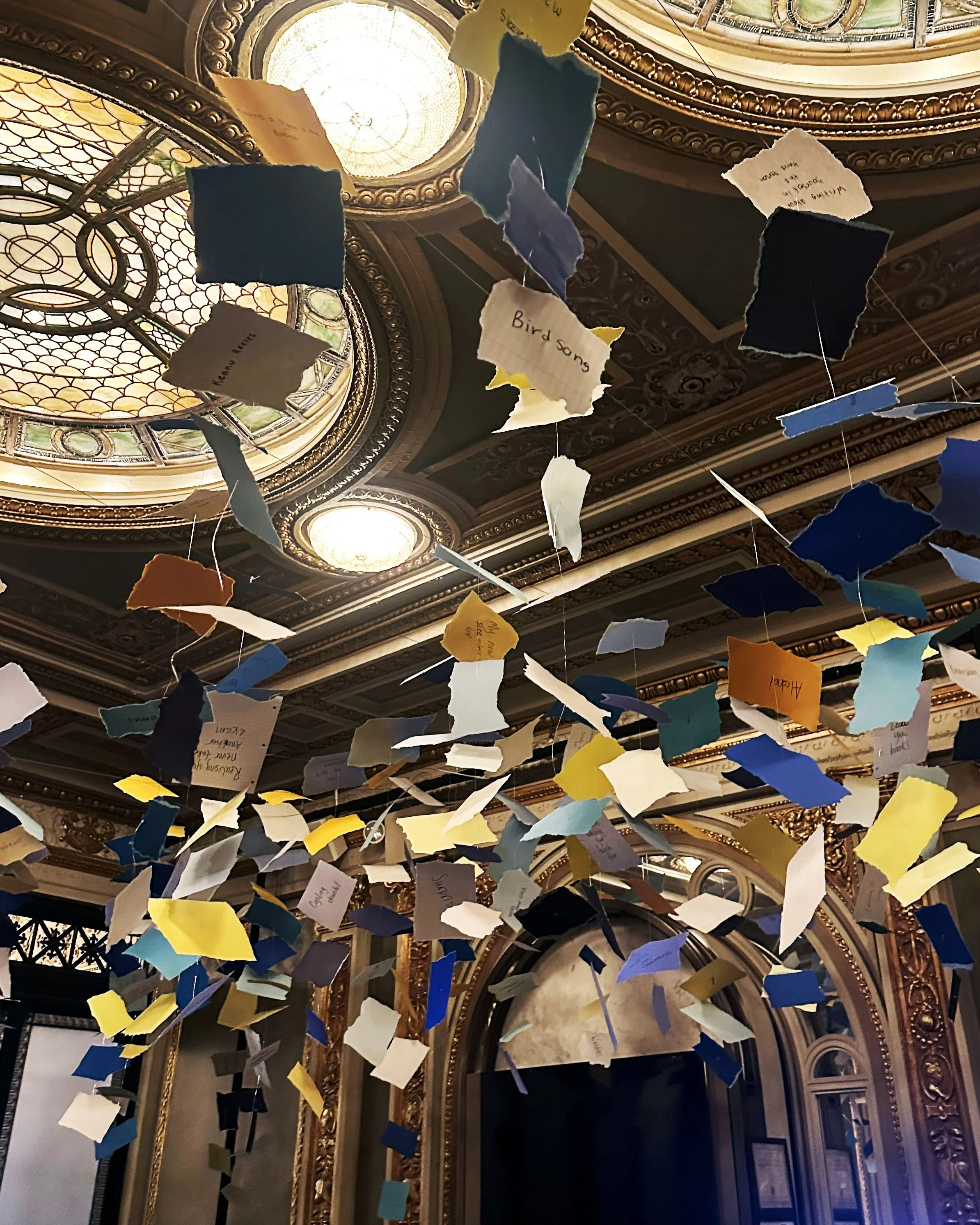 Paper garland instillation in the lobby of broadways Every Brilliant Thing