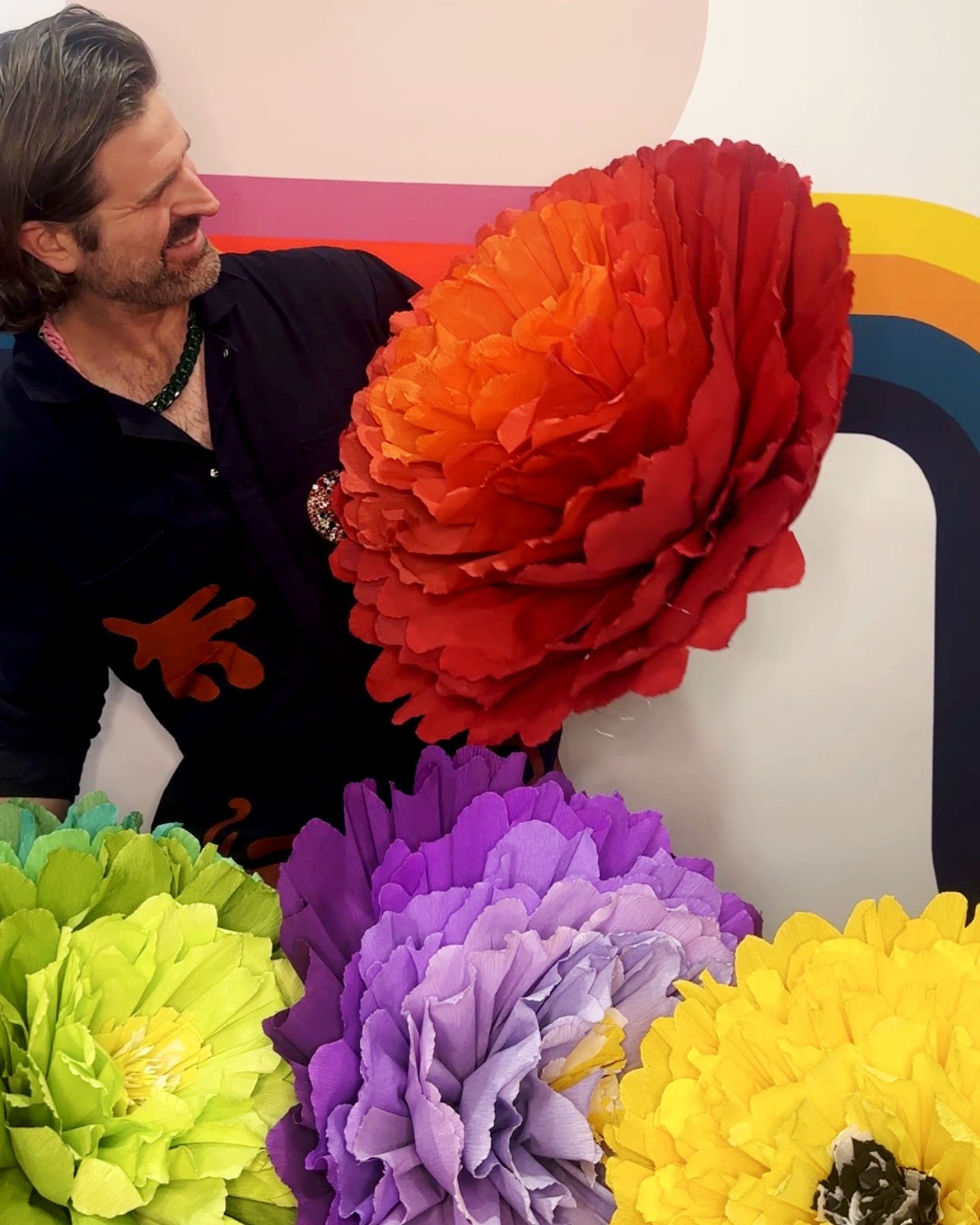 Different colored handmade crepe flowers 