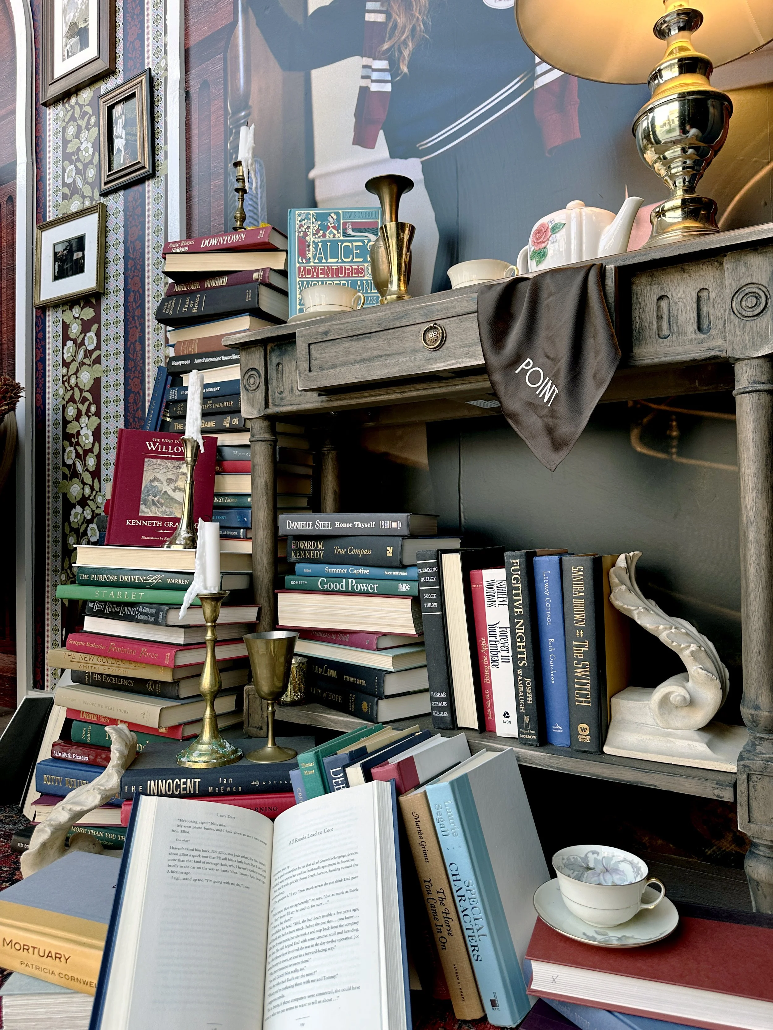 English countryside cottage core still life styling of books, candlesticks, and grandmas favorite things