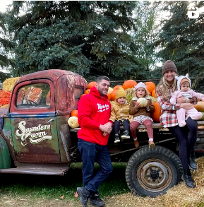 saunders farm fall activations vintage truck photo moment farm chic pumpkin stacks farm event decor Nick sizemore color studios family on vintage truck