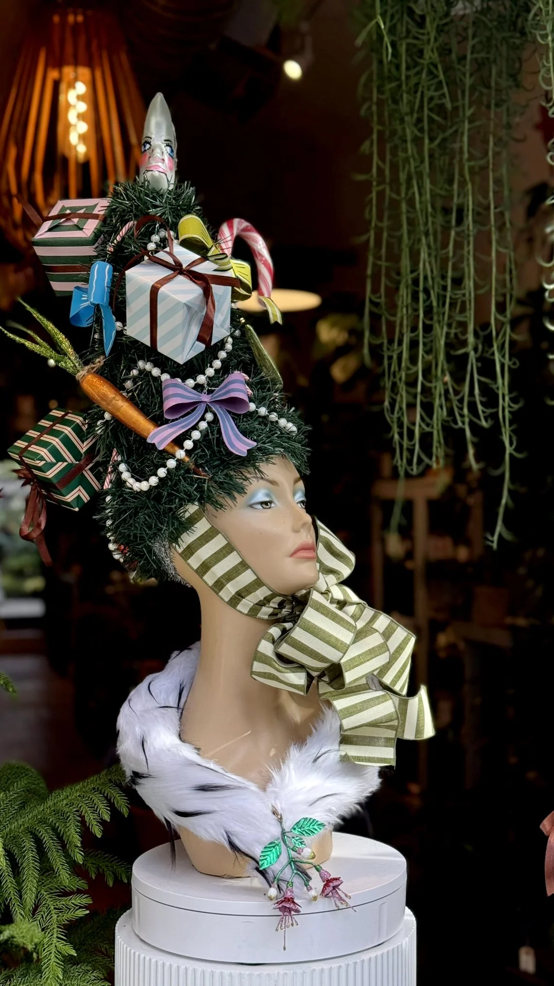 Tend Greenpoint - Mannequin Heads featuring retro beehive Christmas tree hat. Stuffed with ornaments. Retail window design by Nick Sizemore 