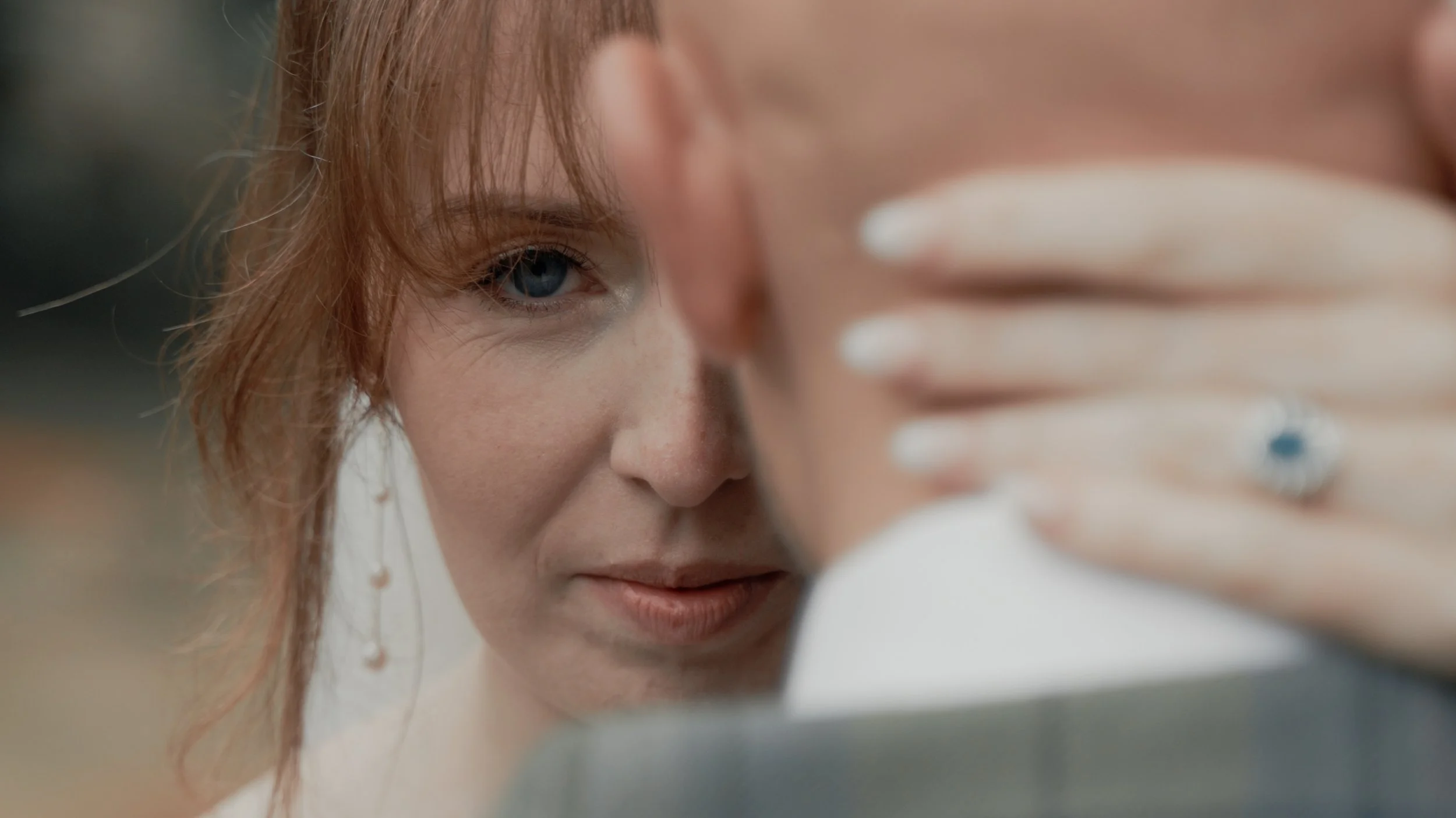 Story Through Wedding Films capturing a Bride at the Galgorm on a rainy day