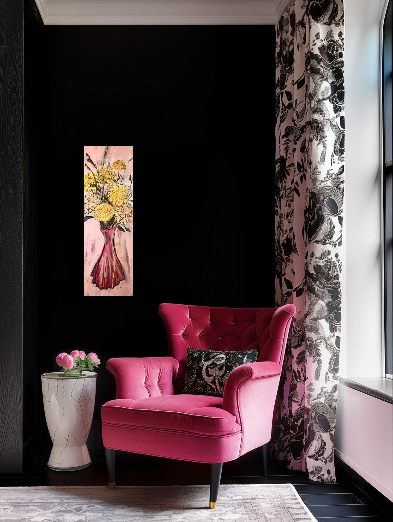 A pink velvet armchair with tufted backrest and a black decorative pillow with a floral pattern, next to a white side table with pink flowers, in a room with black walls, floral curtains, and a large window.